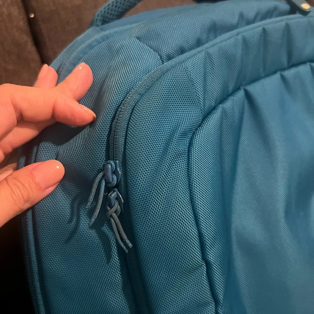 Incase Teal Backpack with Yellow Zipper